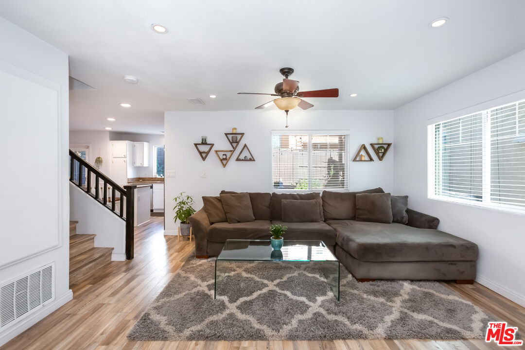 12248 Willowbend Lane Sylmar, CA 91342 - Photo 5 of 52 a living room with furniture and a window