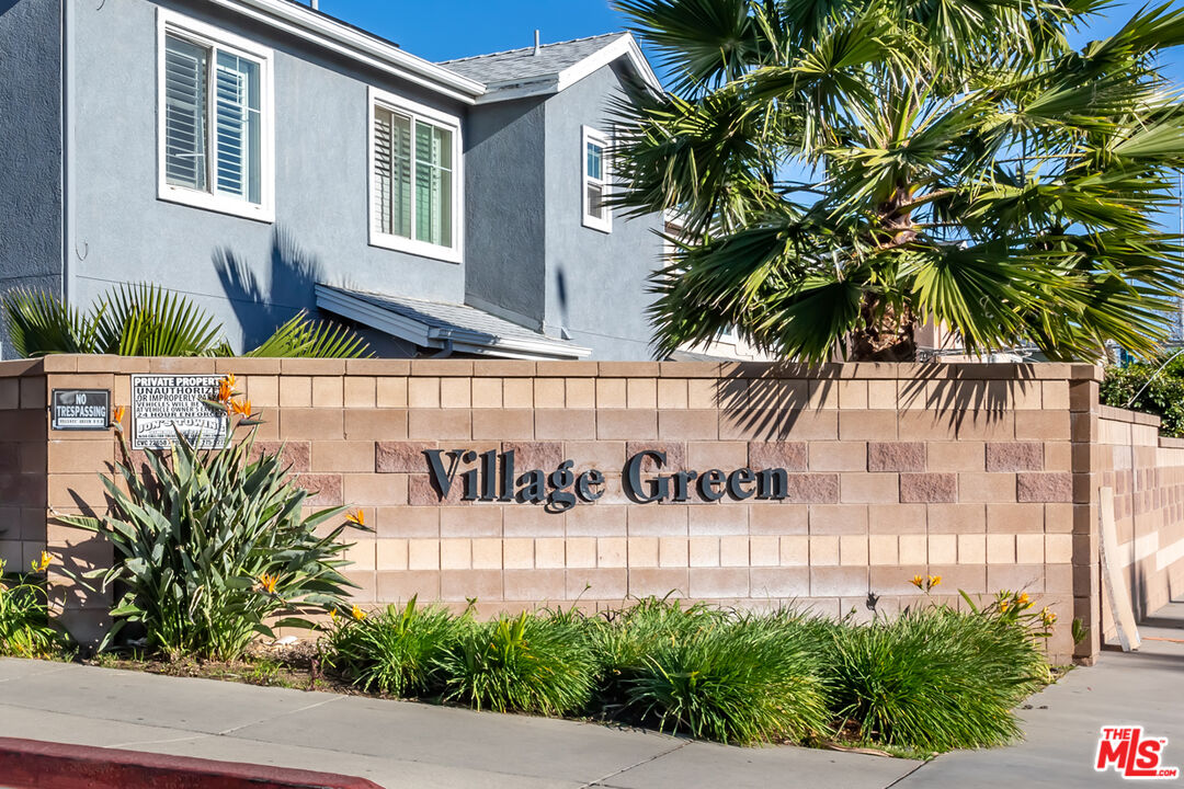 12248 Willowbend Lane Sylmar, CA 91342 - Photo 52 of 52 a front view of a house with a garden