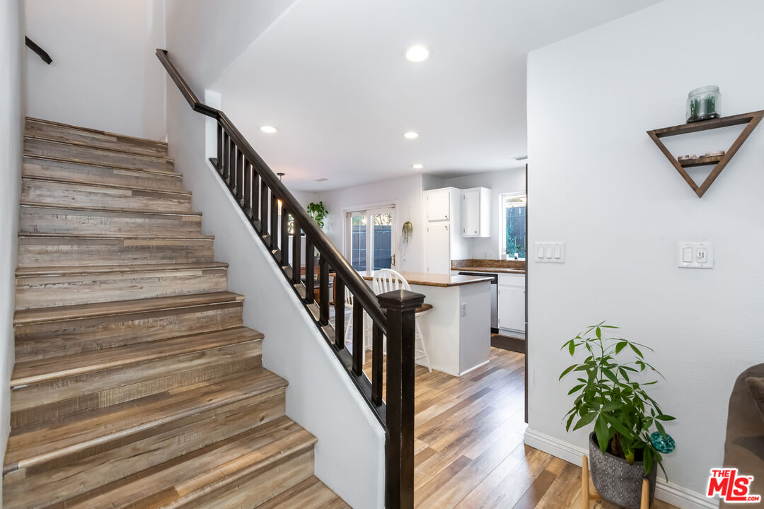 12248 Willowbend Lane Sylmar, CA 91342 - Photo 9 of 52 a view of entryway and hall with wooden floor
