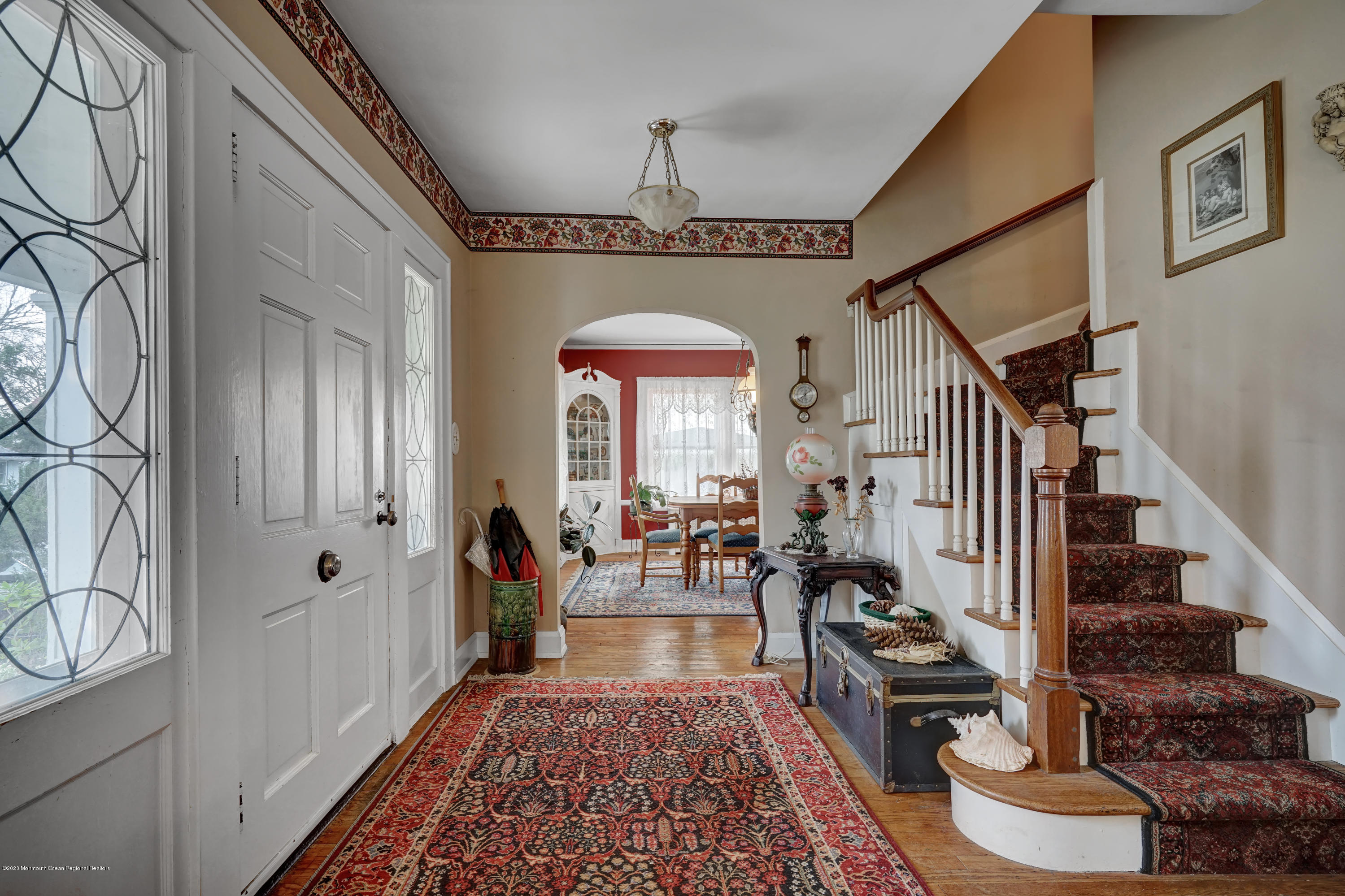 511 Wildwood Road West Allenhurst, NJ 07711 - Photo 2 of 39 a living room with furniture fireplace and rug