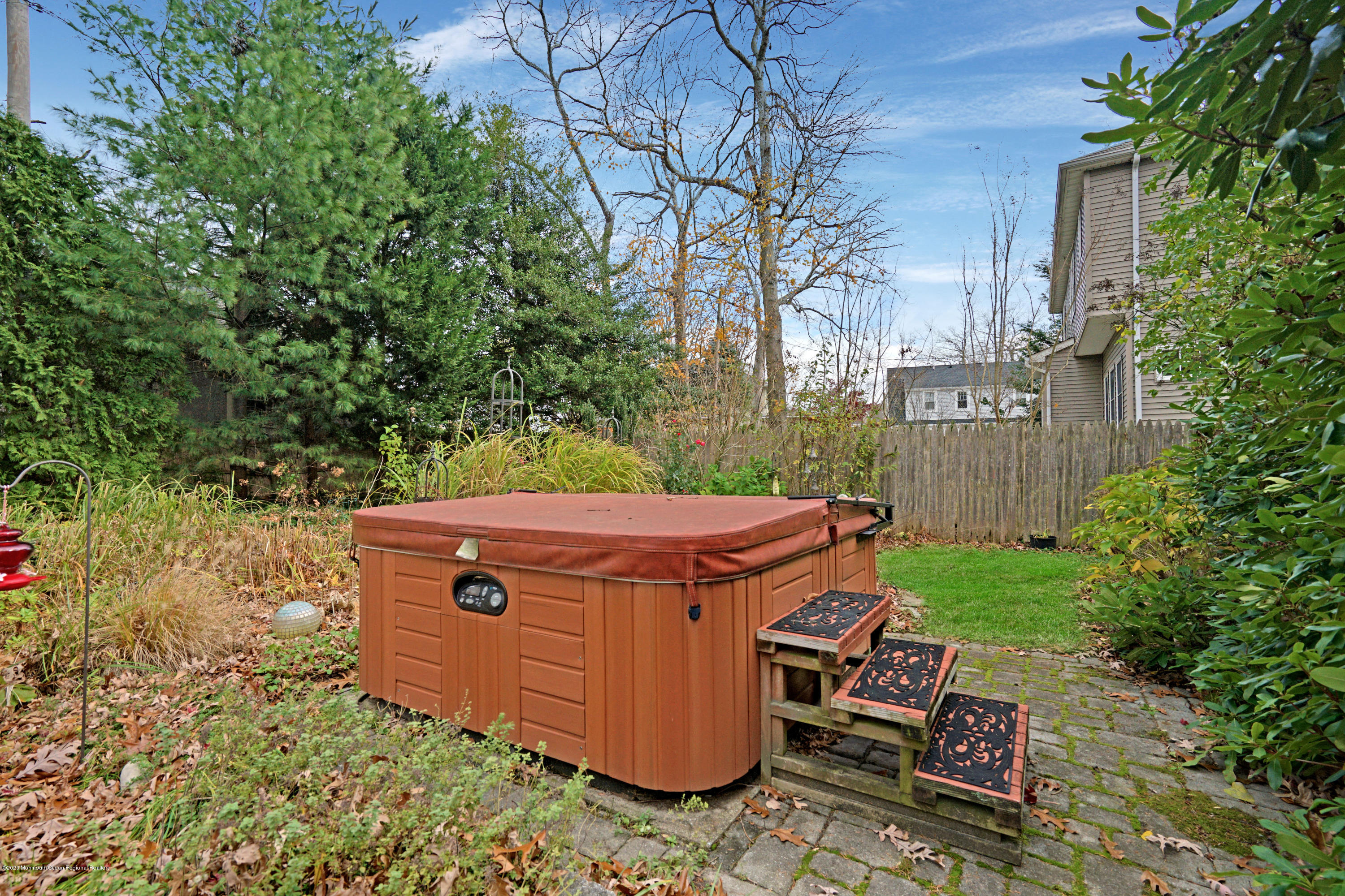 511 Wildwood Road West Allenhurst, NJ 07711 - Photo 17 of 39 a view of a backyard with chairs