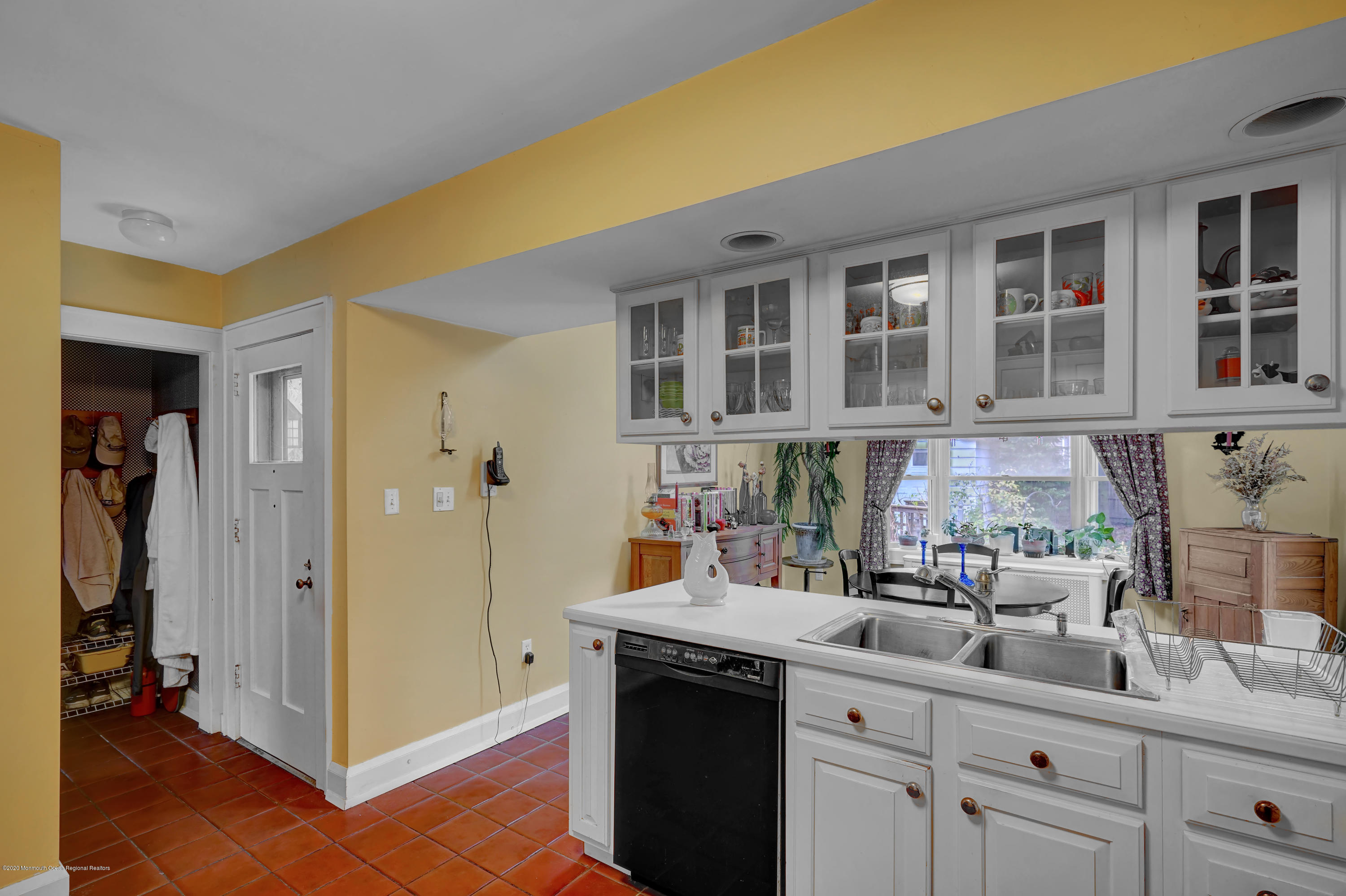 511 Wildwood Road West Allenhurst, NJ 07711 - Photo 24 of 39 a kitchen with a sink and cabinets