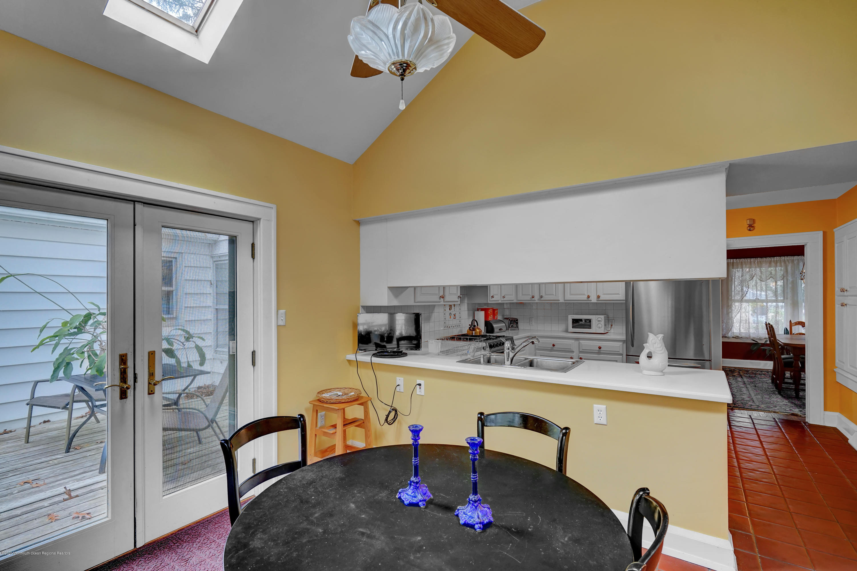 511 Wildwood Road West Allenhurst, NJ 07711 - Photo 29 of 39 a dining room with furniture and wooden floor