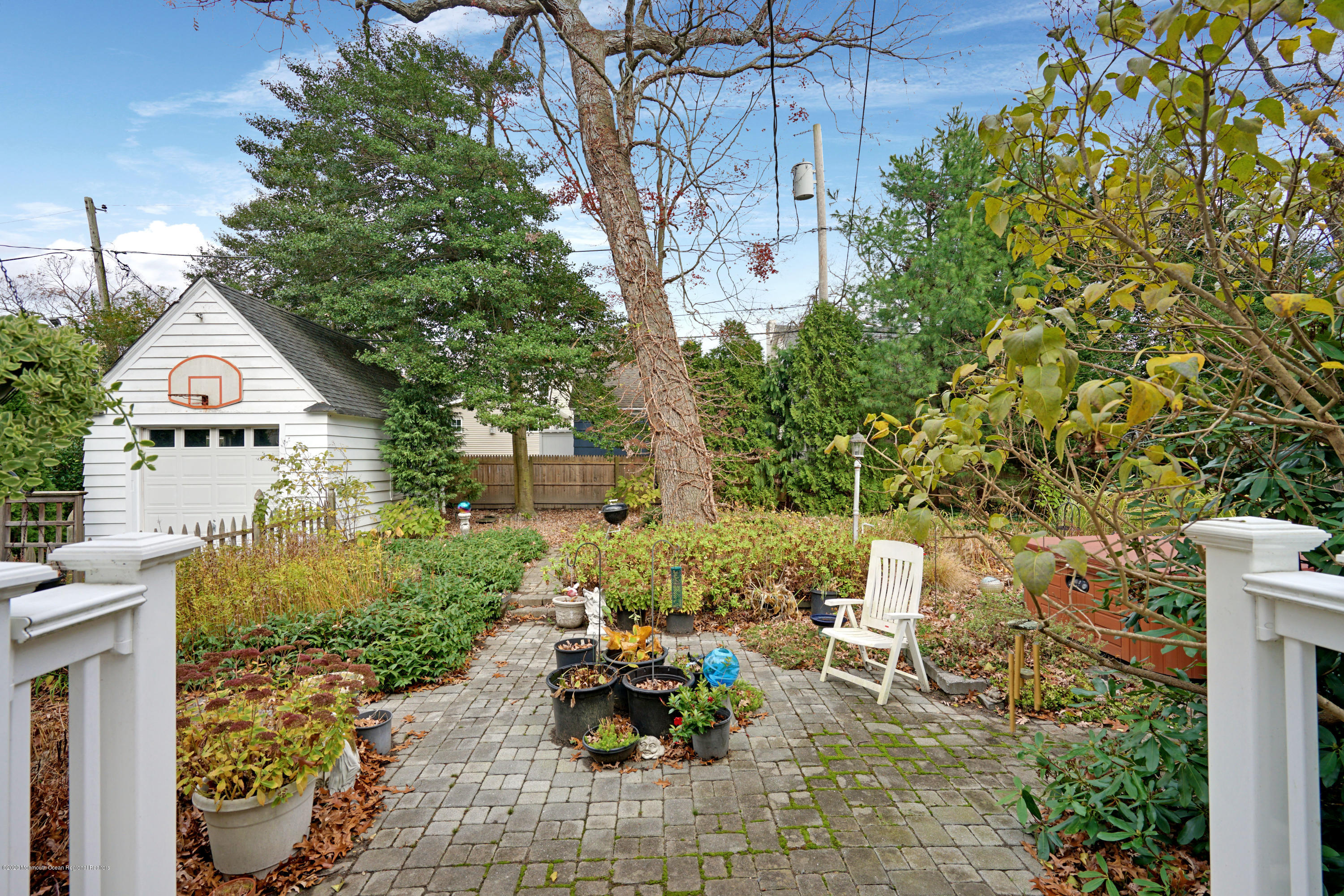 511 Wildwood Road West Allenhurst, NJ 07711 - Photo 34 of 39 a view of a backyard with sitting area and garden