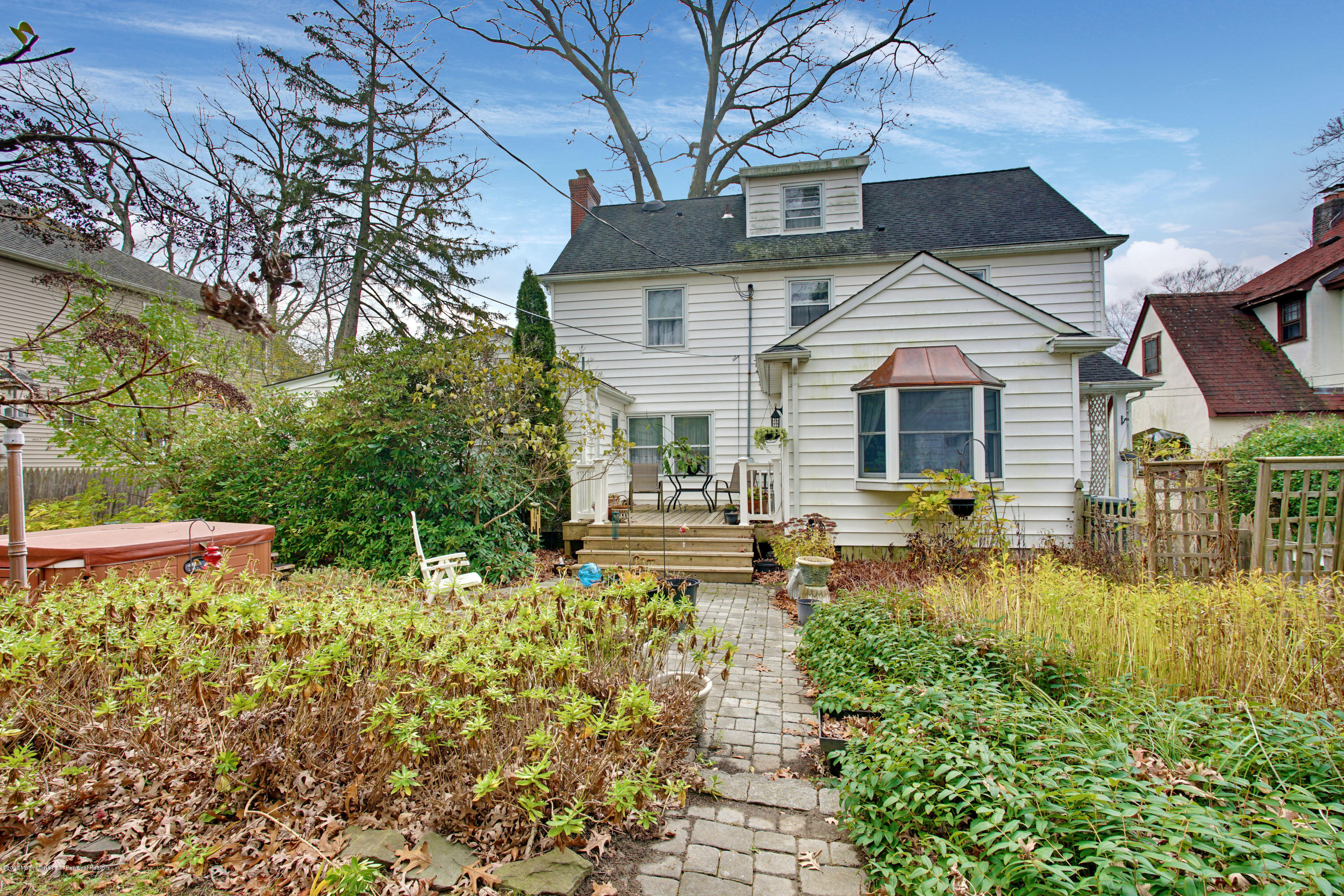 511 Wildwood Road West Allenhurst, NJ 07711 - Photo 39 of 39 a front view of a house with garden