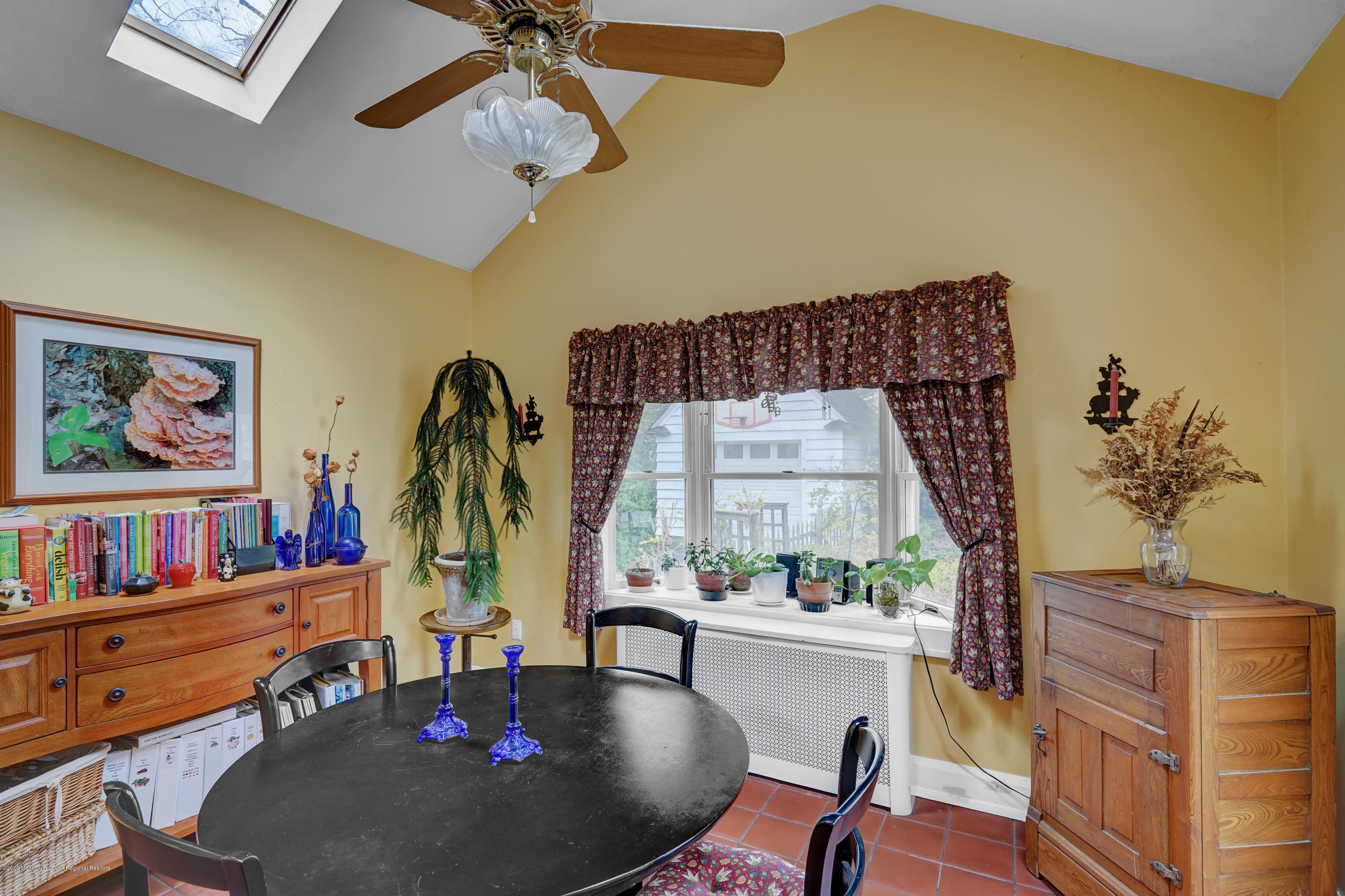 511 Wildwood Road West Allenhurst, NJ 07711 - Photo 6 of 39 a living room with fireplace furniture and a potted plant