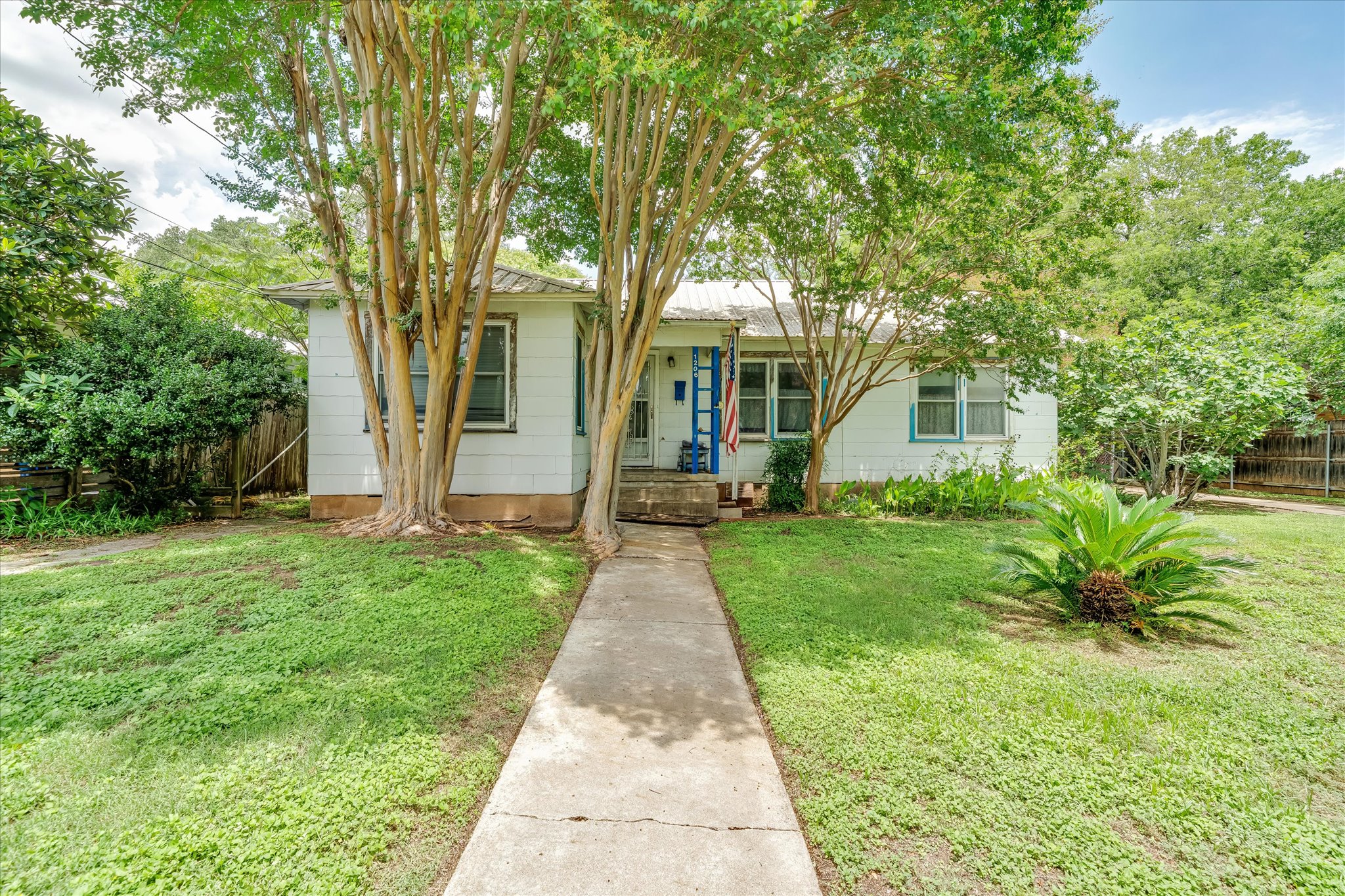 1206 Ruth Avenue Austin, TX 78757 - Photo 19 of 38 front view of a house with a yard