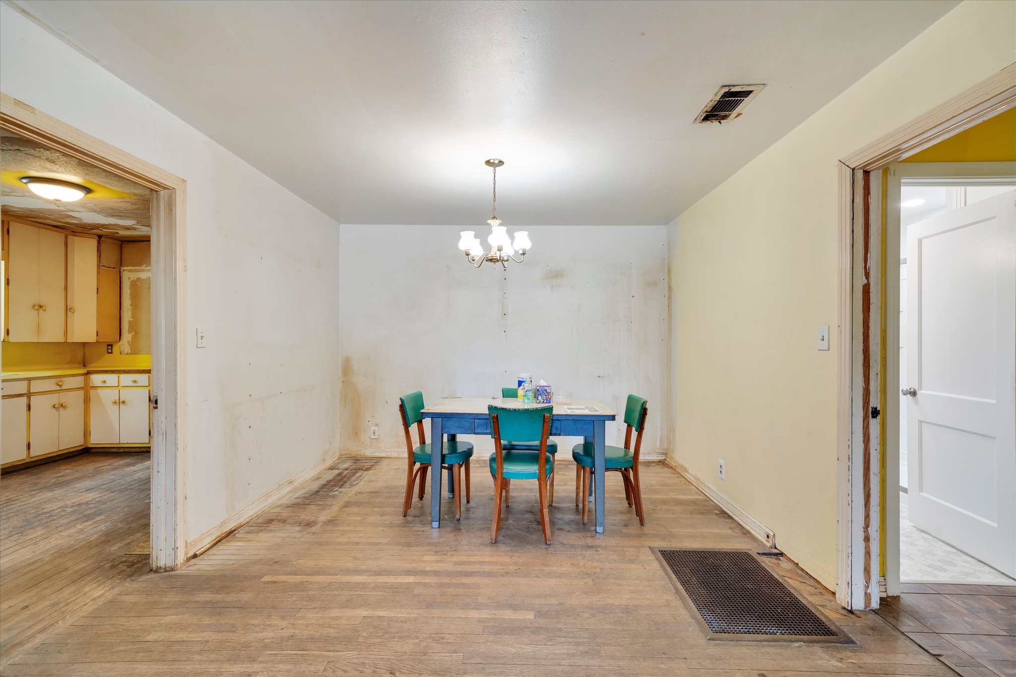 1206 Ruth Avenue Austin, TX 78757 - Photo 31 of 38 a view of a dining room with furniture and chandelier