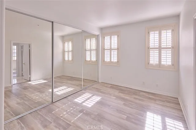 a view of an empty room with windows