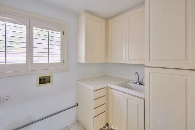 a view of cabinets and window
