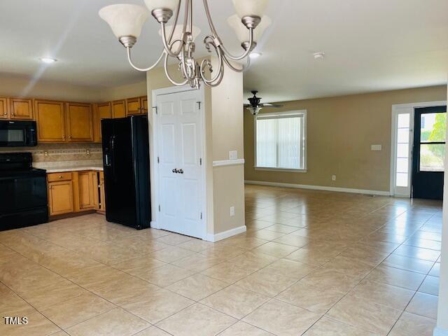 151 Bear Oak Drive Smithfield, NC 27577 - Photo 6 of 16 a view of a kitchen with a sink and cabinets