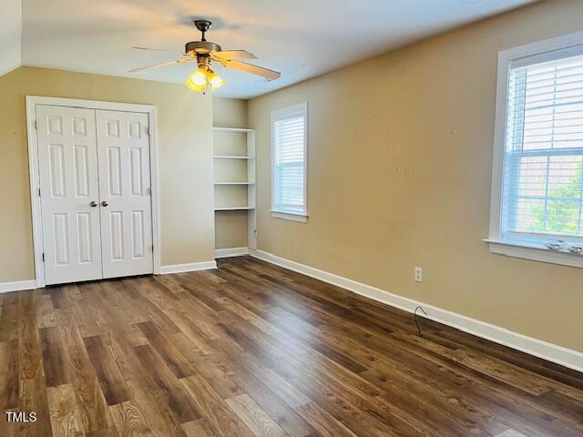 151 Bear Oak Drive Smithfield, NC 27577 - Photo 9 of 16 wooden floor in an empty room with a window