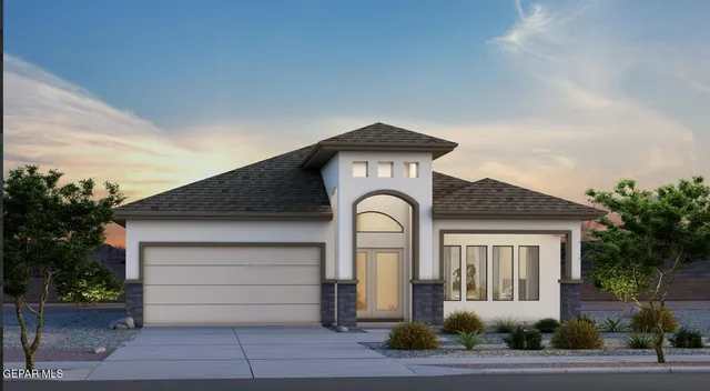 a front view of a house with garage