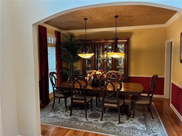 a view of a dining room with furniture window and chairs