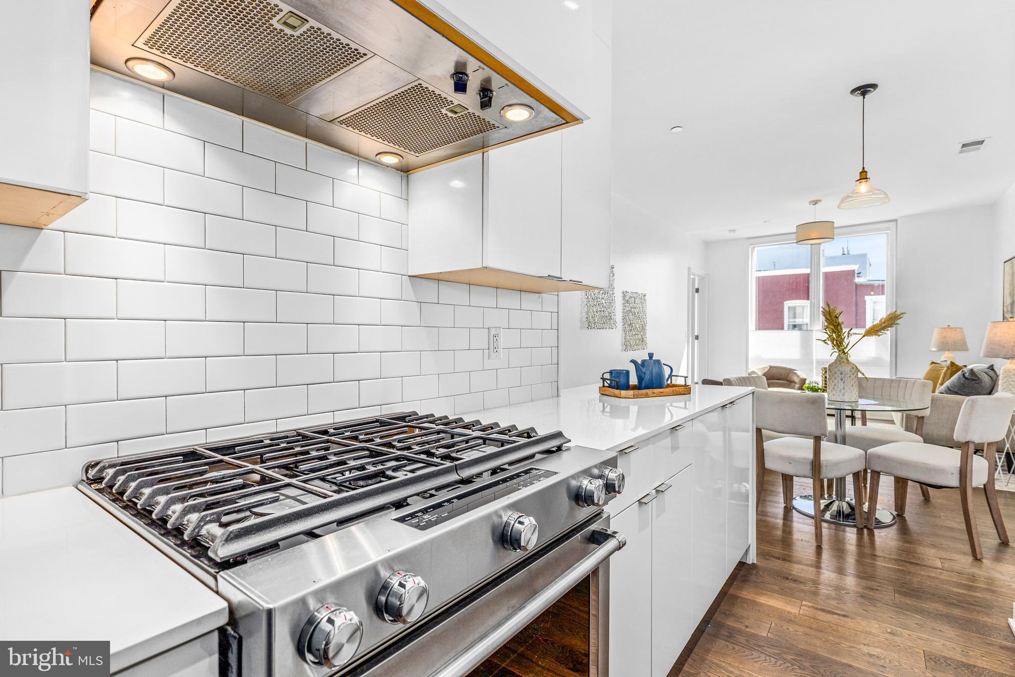 1380 Quincy Street Northwest, Unit 3E Washington, DC 20010 - Photo 12 of 42 a stove top oven sitting inside of a kitchen