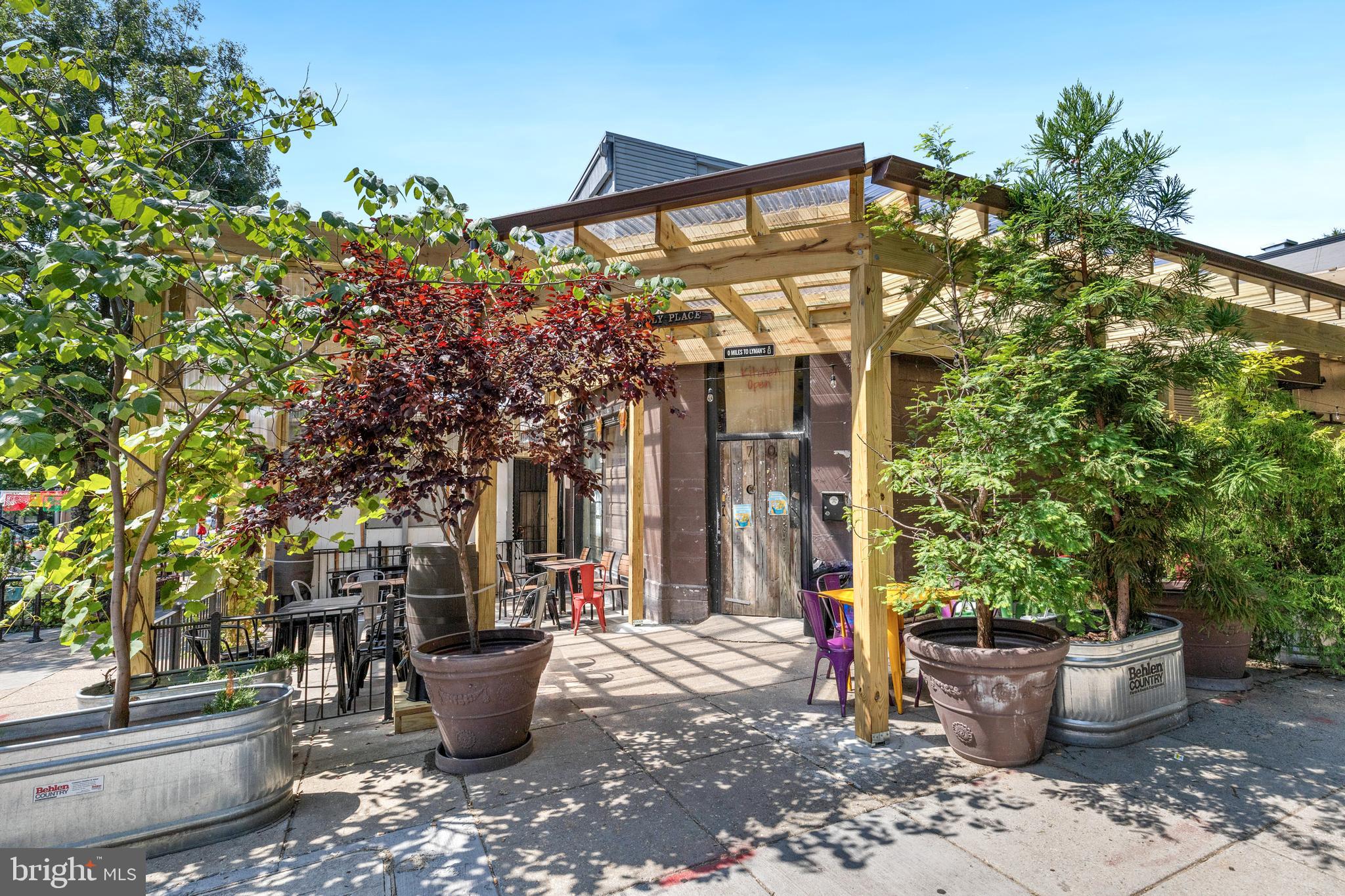 1380 Quincy Street Northwest, Unit 3E Washington, DC 20010 - Photo 39 of 42 a front view of a house with outdoor seating