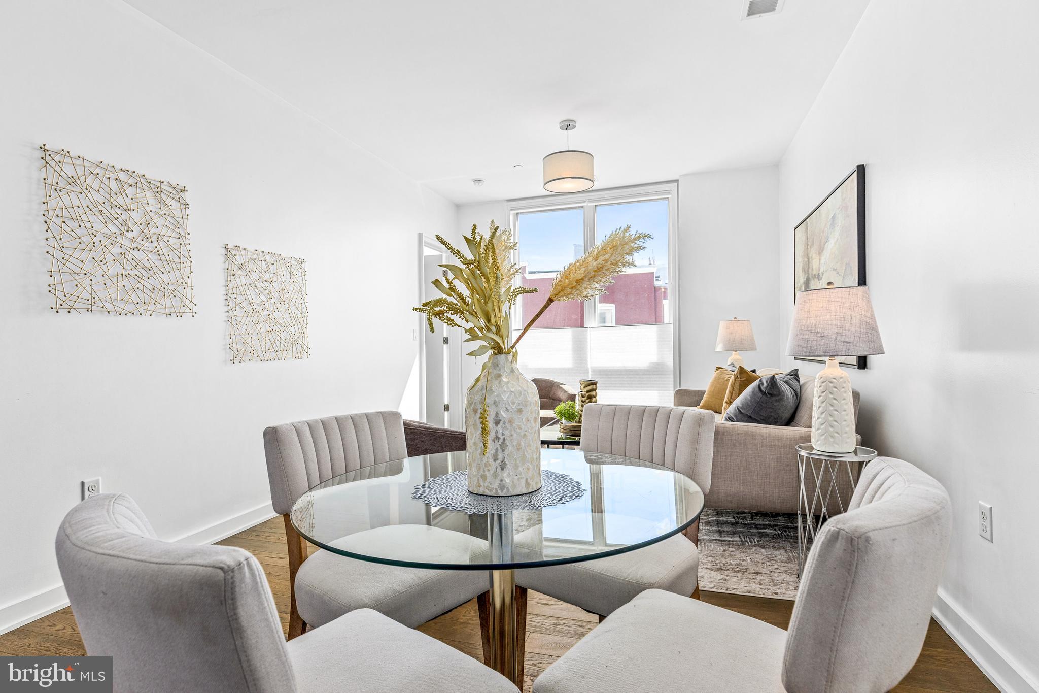 1380 Quincy Street Northwest, Unit 3E Washington, DC 20010 - Photo 5 of 42 a living room with furniture and a wooden floor