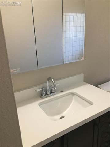 4425 Beaumont Road Colorado Springs, CO 80916 - Photo 12 of 19 Upstairs Bathroom