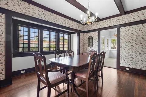 a large kitchen with stainless steel appliances granite countertop a stove and a sink