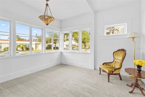 a bedroom with a bed and a fireplace