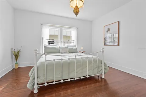 a bathroom with a toilet a sink and a mirror