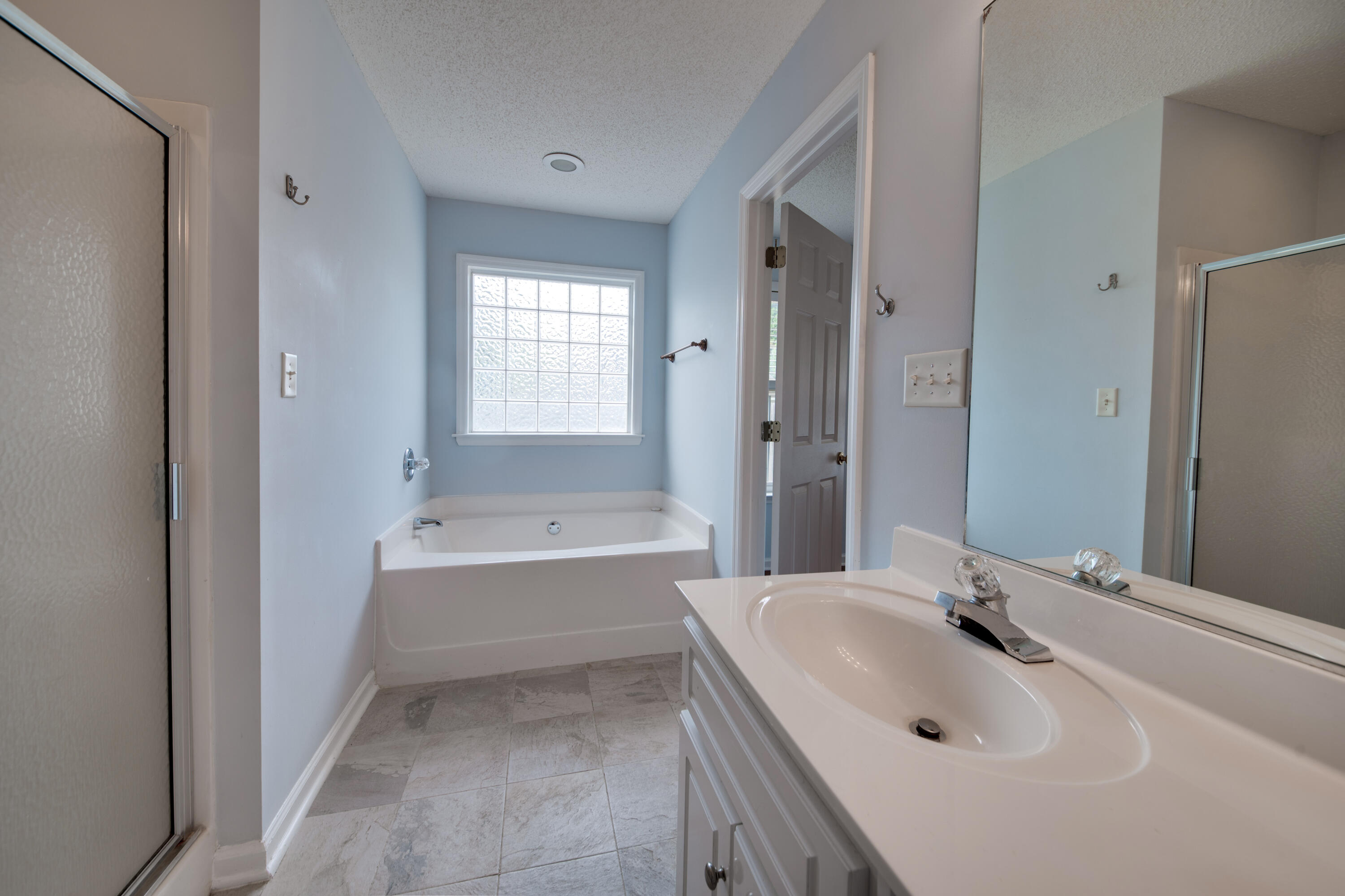 8 Chappells Road Aiken, SC 29803 - Photo 7 of 15 a bathroom with a sink and a bathtub