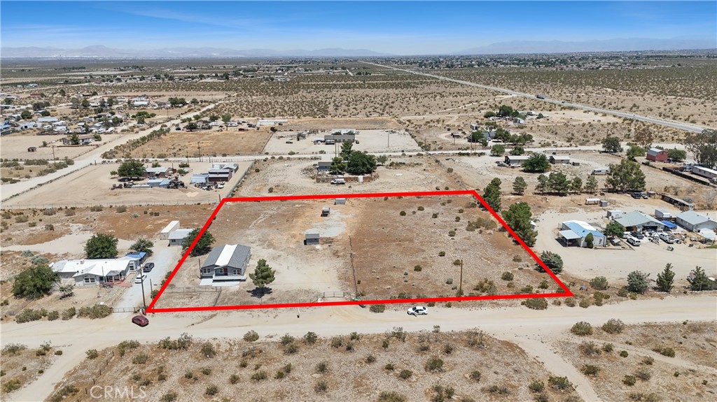 14245 Mescalero Road Phelan, CA 92371 - Photo 1 of 1 an aerial view of beach and ocean