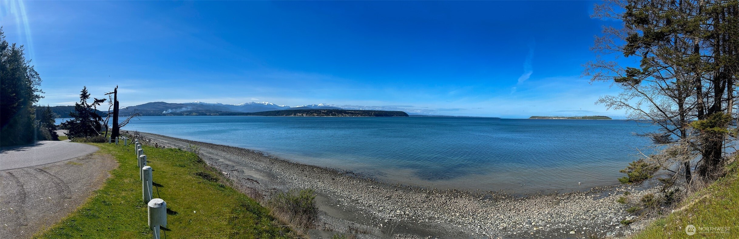 85 Quinault Loop Port Townsend, WA 98368 - Photo 21 of 34 a view of a lake with a yard