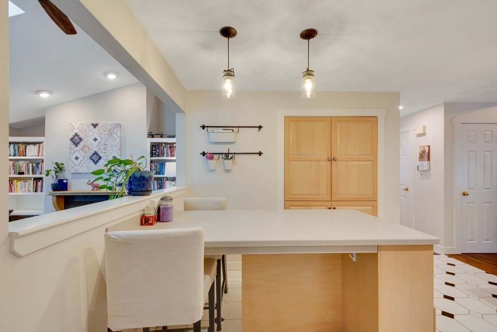 8 Aspen Circle Framingham, MA 01701 - Photo 14 of 31 a kitchen with kitchen island a sink stainless steel appliances and cabinets