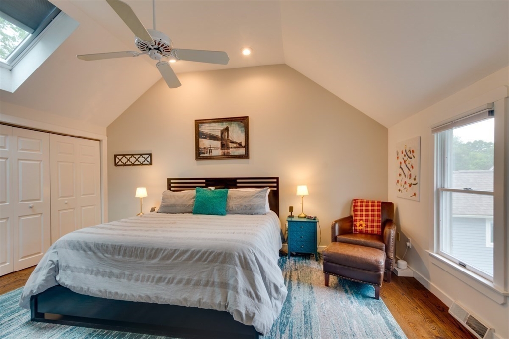 8 Aspen Circle Framingham, MA 01701 - Photo 19 of 31 a bedroom with a bed and wooden floor