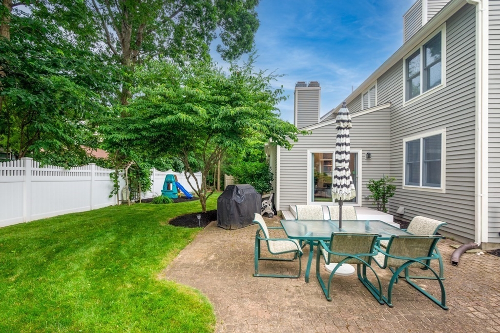 8 Aspen Circle Framingham, MA 01701 - Photo 30 of 31 a view of a house with backyard and sitting area