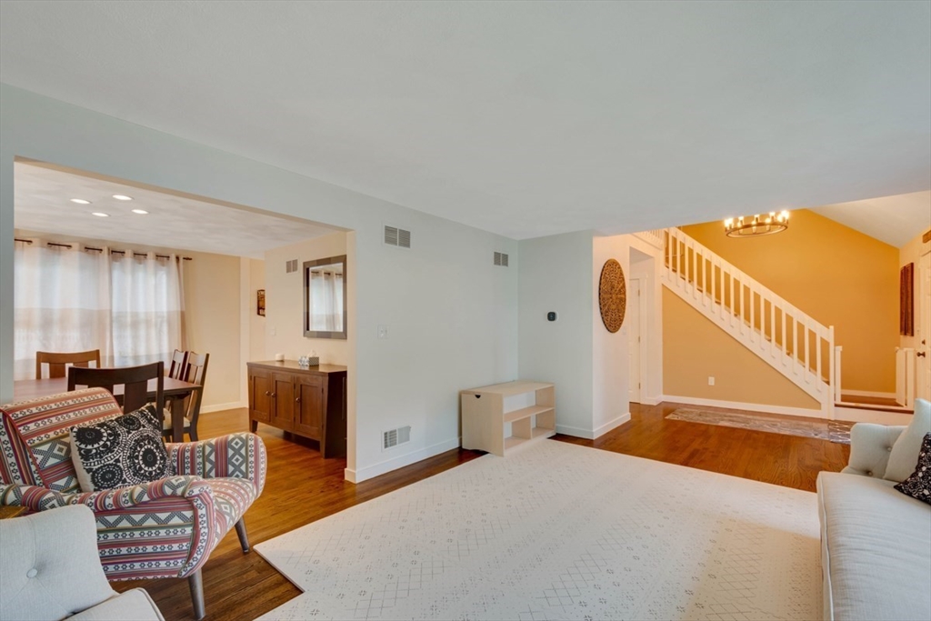 8 Aspen Circle Framingham, MA 01701 - Photo 3 of 31 a living room with furniture and a table