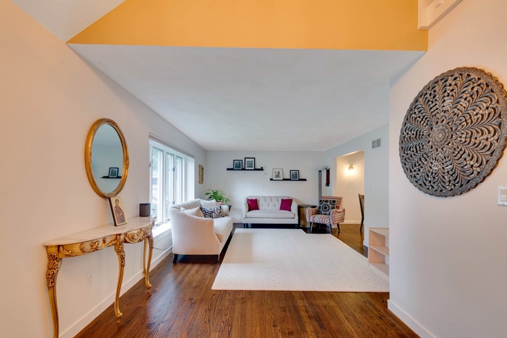 8 Aspen Circle Framingham, MA 01701 - Photo 4 of 31 a living room with furniture and a wooden floor