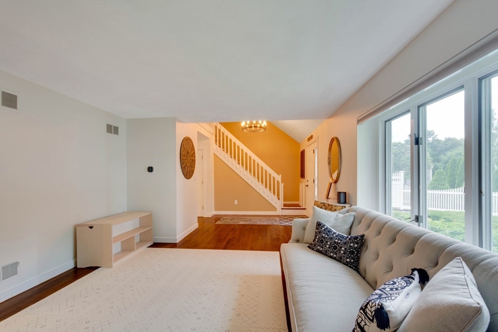 8 Aspen Circle Framingham, MA 01701 - Photo 6 of 31 a living room with furniture and a large window