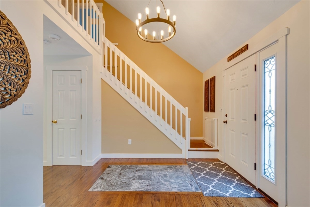 8 Aspen Circle Framingham, MA 01701 - Photo 8 of 31 a view of an entryway with wooden floor