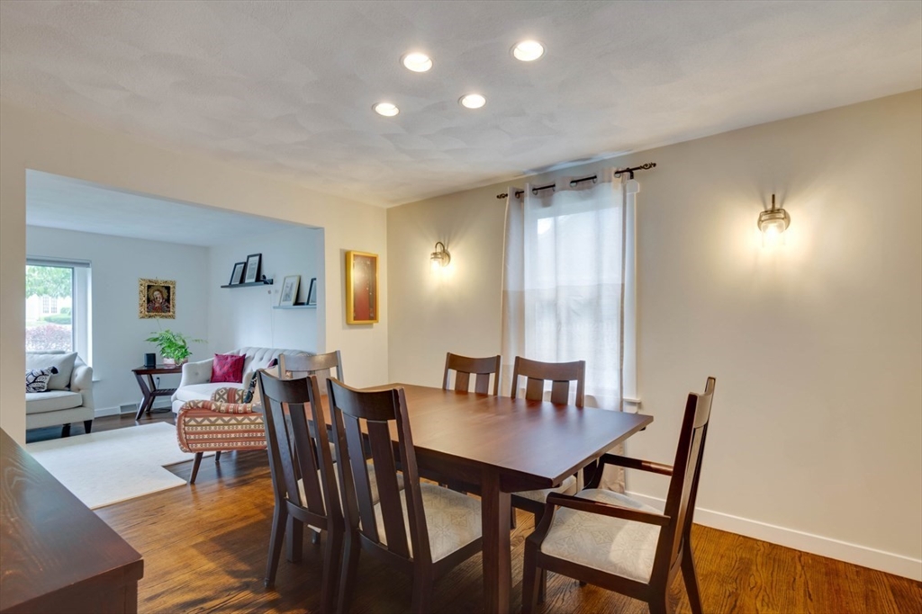 8 Aspen Circle Framingham, MA 01701 - Photo 9 of 31 a view of a dining room with furniture and wooden floor