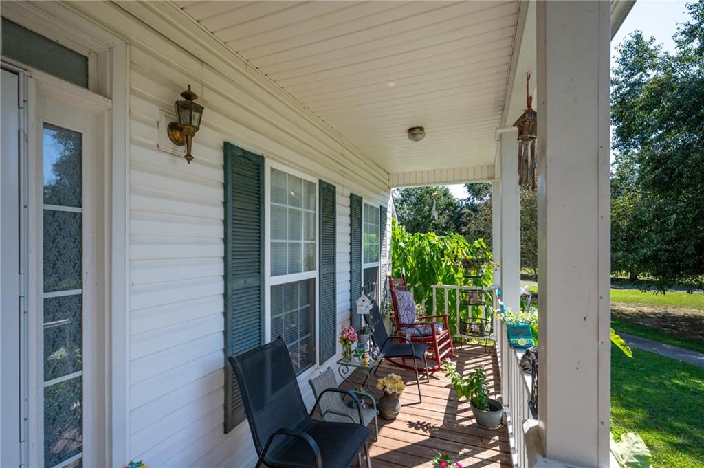 2467 Owens Gin Road Northeast Resaca, GA 30735 - Photo 13 of 44 a view of backyard with outdoor seating and plants