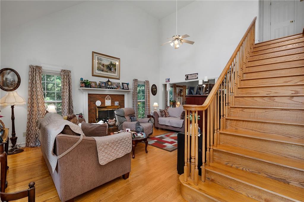 2467 Owens Gin Road Northeast Resaca, GA 30735 - Photo 15 of 44 a living room with furniture and a fireplace