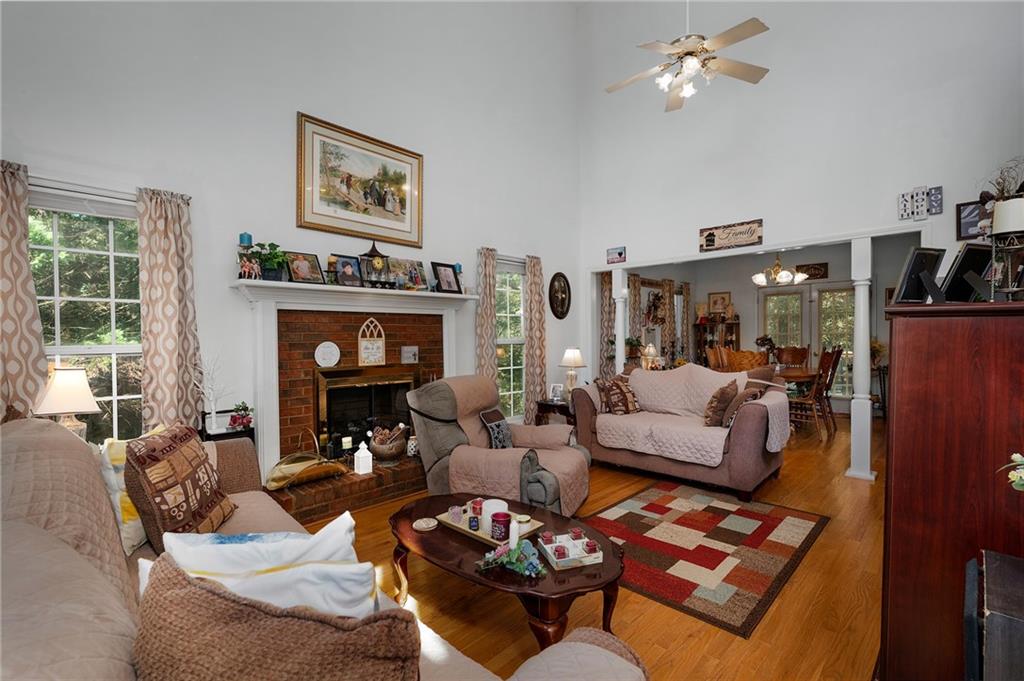 2467 Owens Gin Road Northeast Resaca, GA 30735 - Photo 16 of 44 a living room with furniture and a fireplace