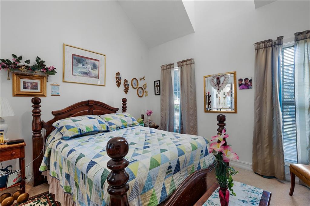 2467 Owens Gin Road Northeast Resaca, GA 30735 - Photo 28 of 44 a bedroom that has a bed and a dresser in it