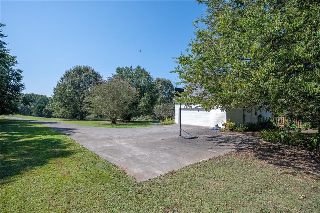 2467 Owens Gin Road Northeast Resaca, GA 30735 - Photo 10 of 44 a view of a outdoor space with a garden
