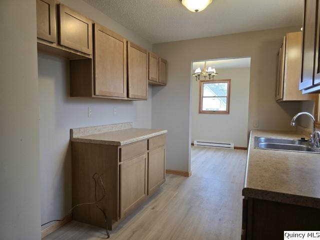 219 South 1st Street Carthage, IL 62321 - Photo 7 of 28 a utility room with cabinets washer and dryer