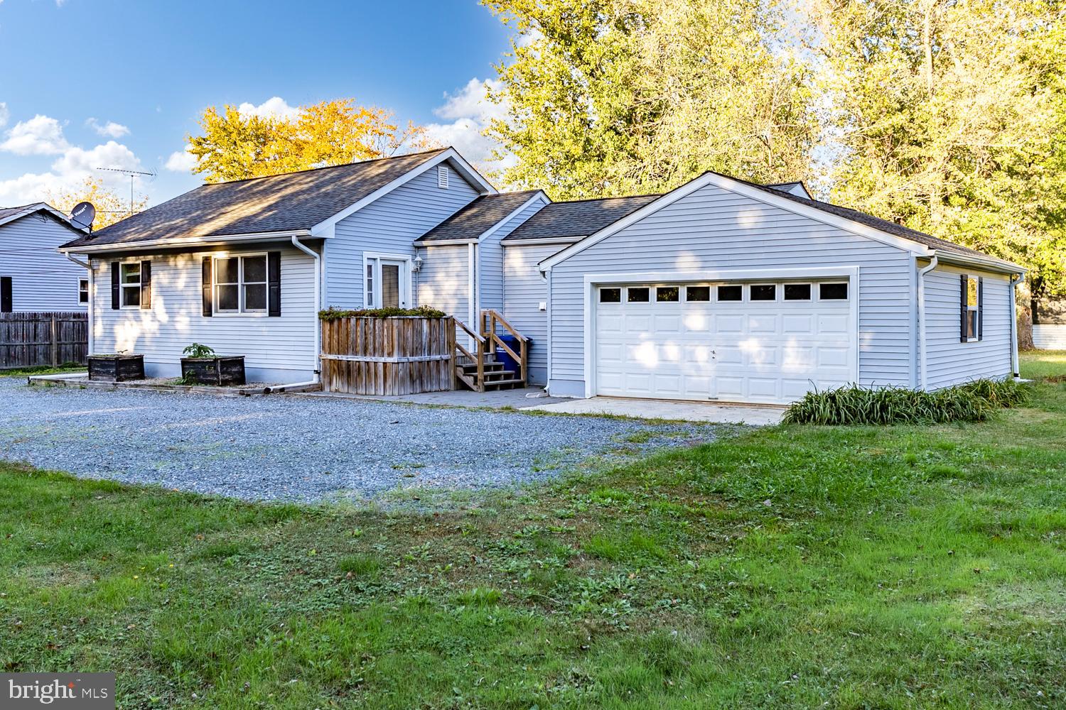907 Bordentown Road Columbus, NJ 08022 - Photo 2 of 25 a front view of a house with a yard and garage