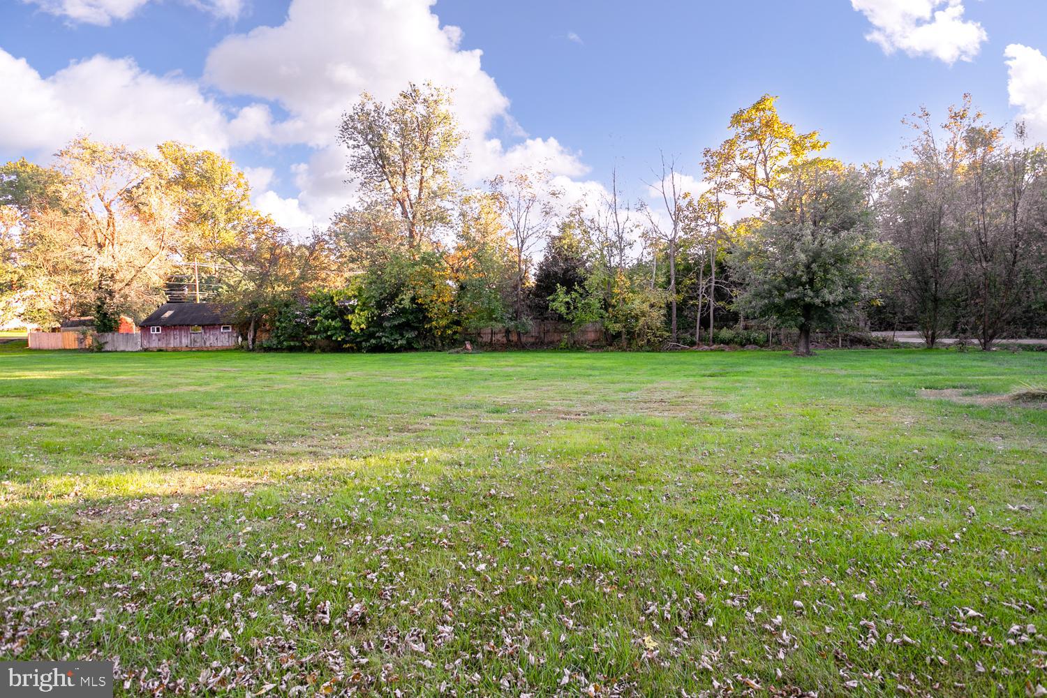 907 Bordentown Road Columbus, NJ 08022 - Photo 23 of 25 a view of a field of grass and trees