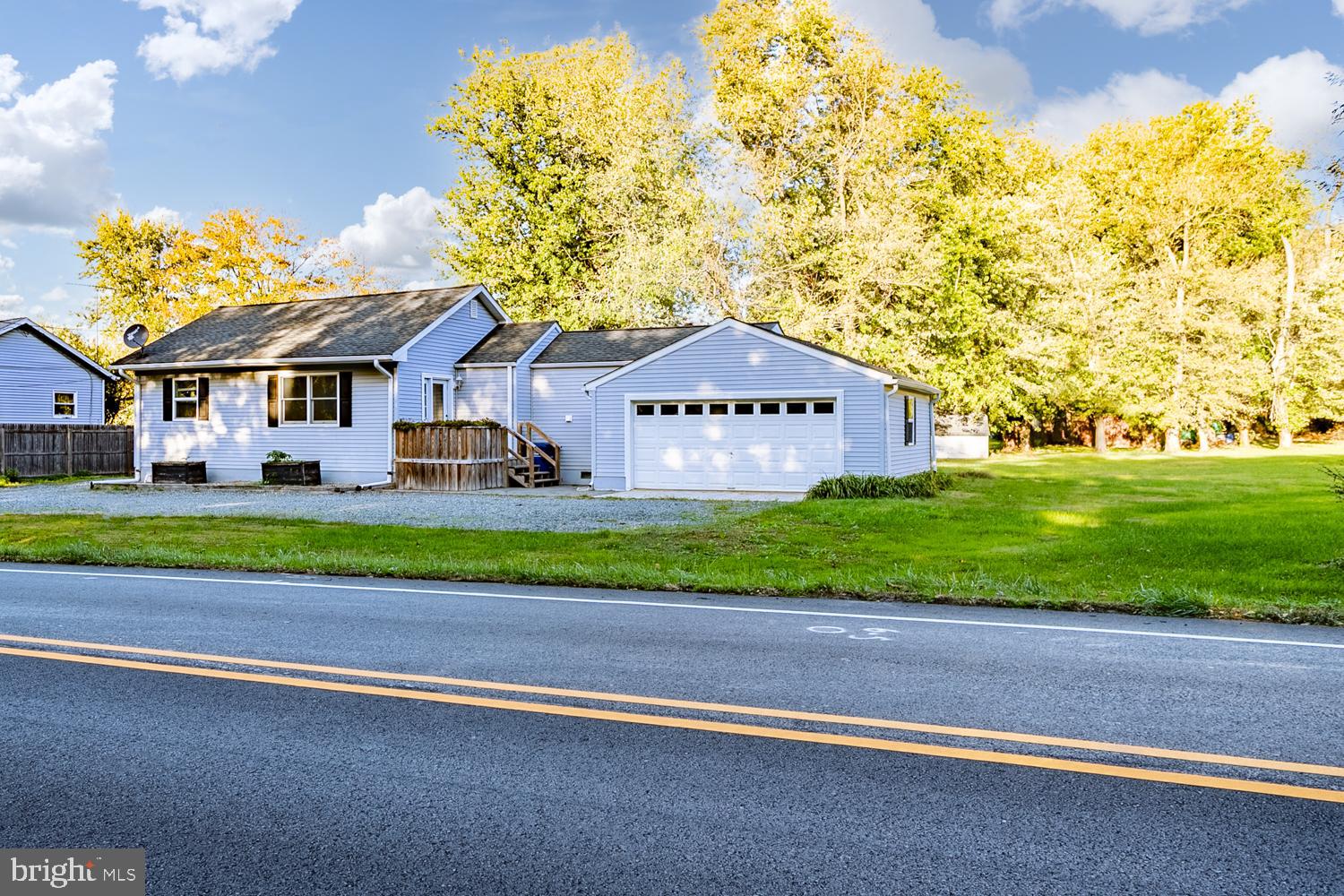 907 Bordentown Road Columbus, NJ 08022 - Photo 25 of 25 a front view of a house with a yard and garage