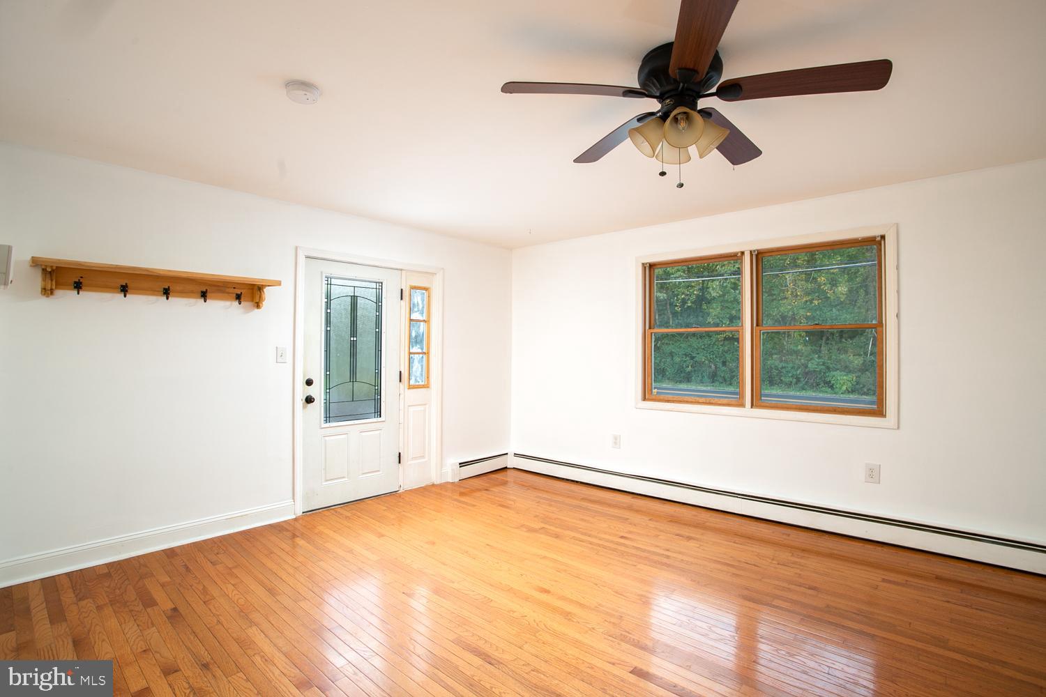 907 Bordentown Road Columbus, NJ 08022 - Photo 5 of 25 a view of an empty room with a window