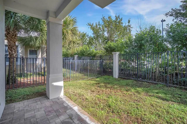 a view of a garden with a small cabin