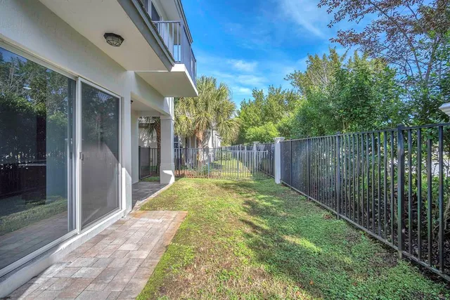 a view of backyard with green space