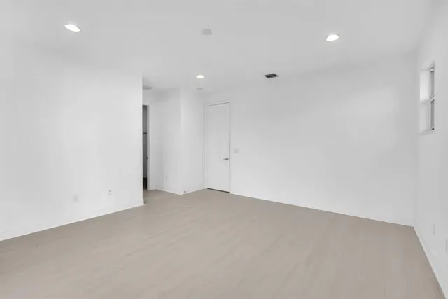 an empty room with an entryway