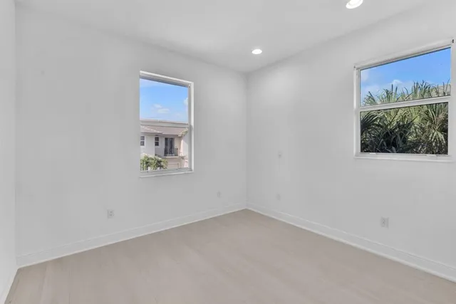 an empty room with windows